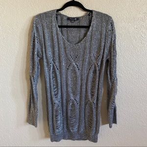 Distressed knit sweater